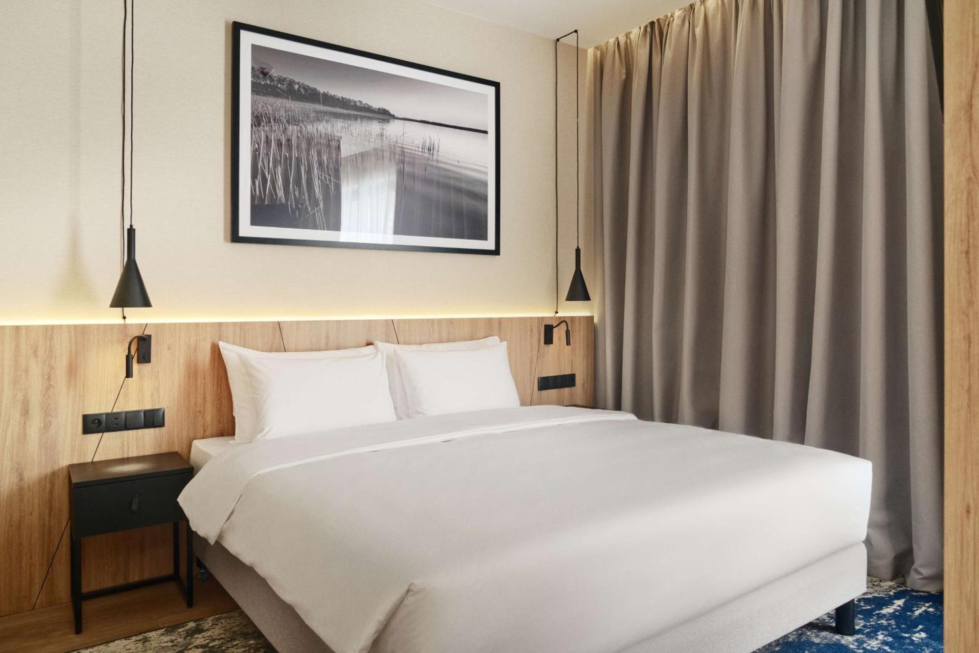 Radisson Blu Resort & Conference Center, Ostroda Mazury ภายนอก รูปภาพ A bedroom at the hotel